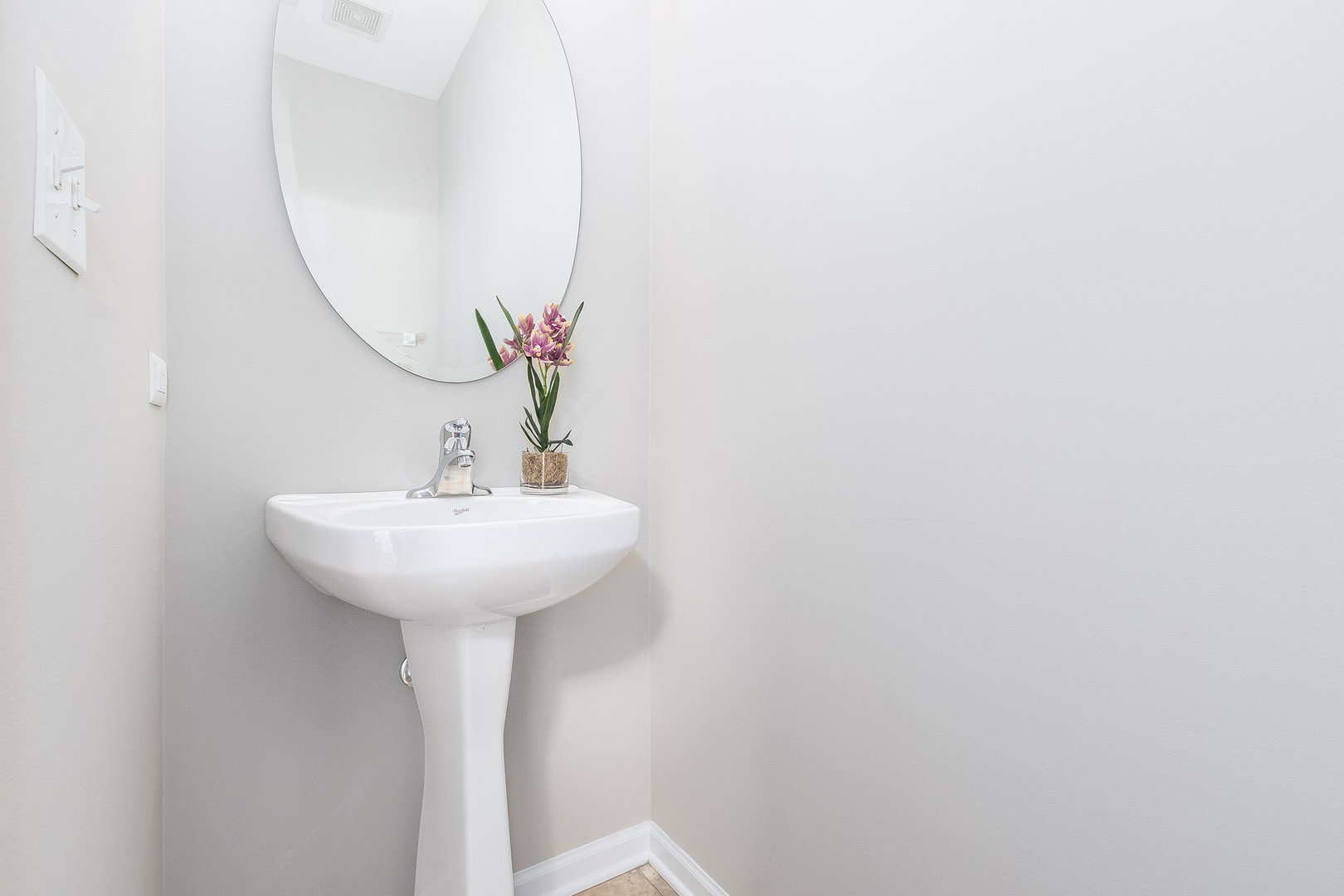 3521 Legacy Drive Joliet, IL 60435 - Photo 21 of 26 a bathroom with a sink and a mirror