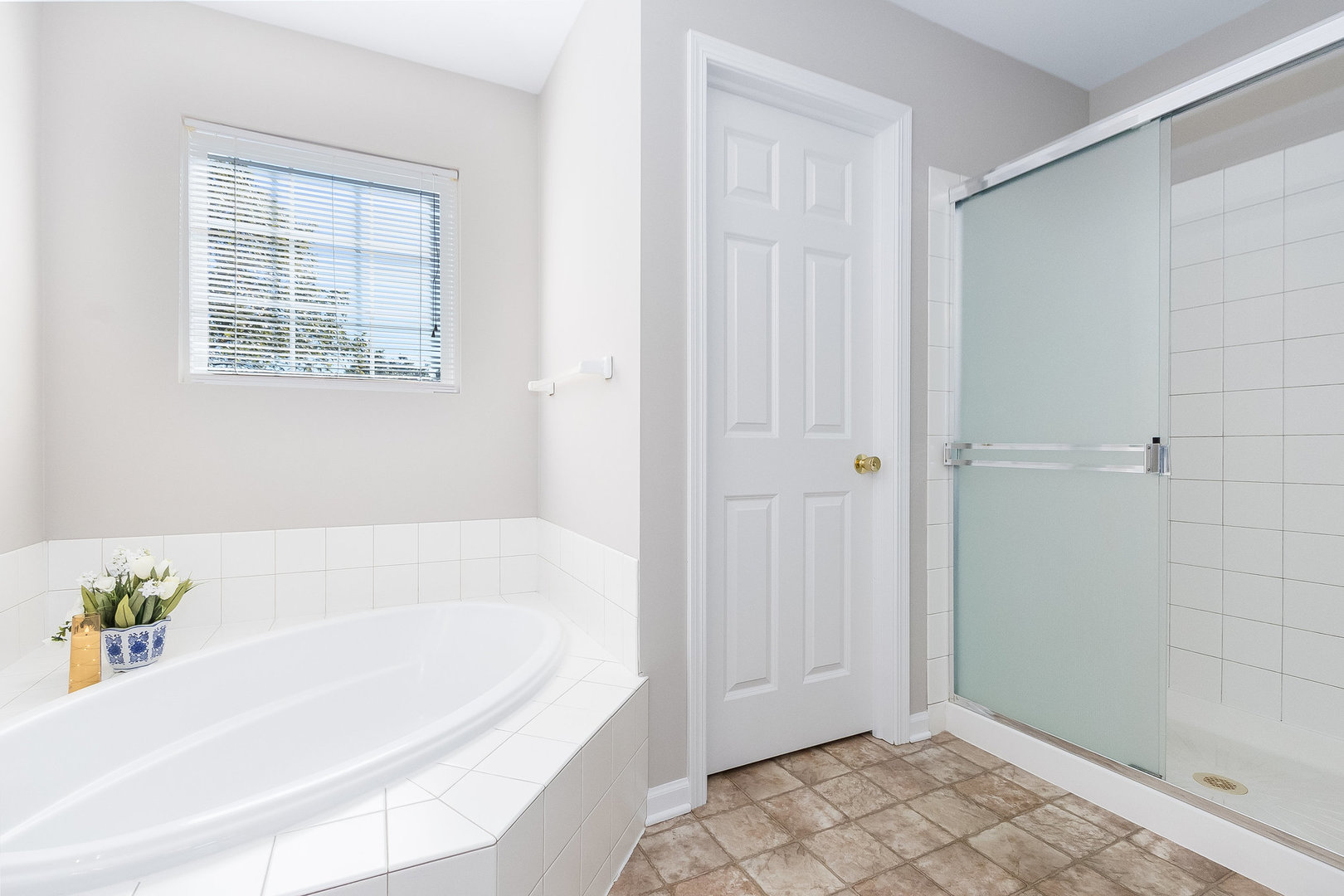 3521 Legacy Drive Joliet, IL 60435 - Photo 10 of 26 a white bath tub sitting in a bathroom