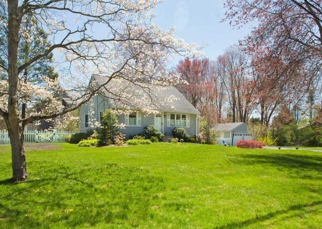 85 Barnhill Road Fairfield, CT 06825 - Photo 1 of 1 a view of a house with a yard