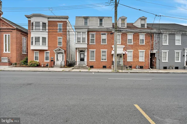a front view of a building with street