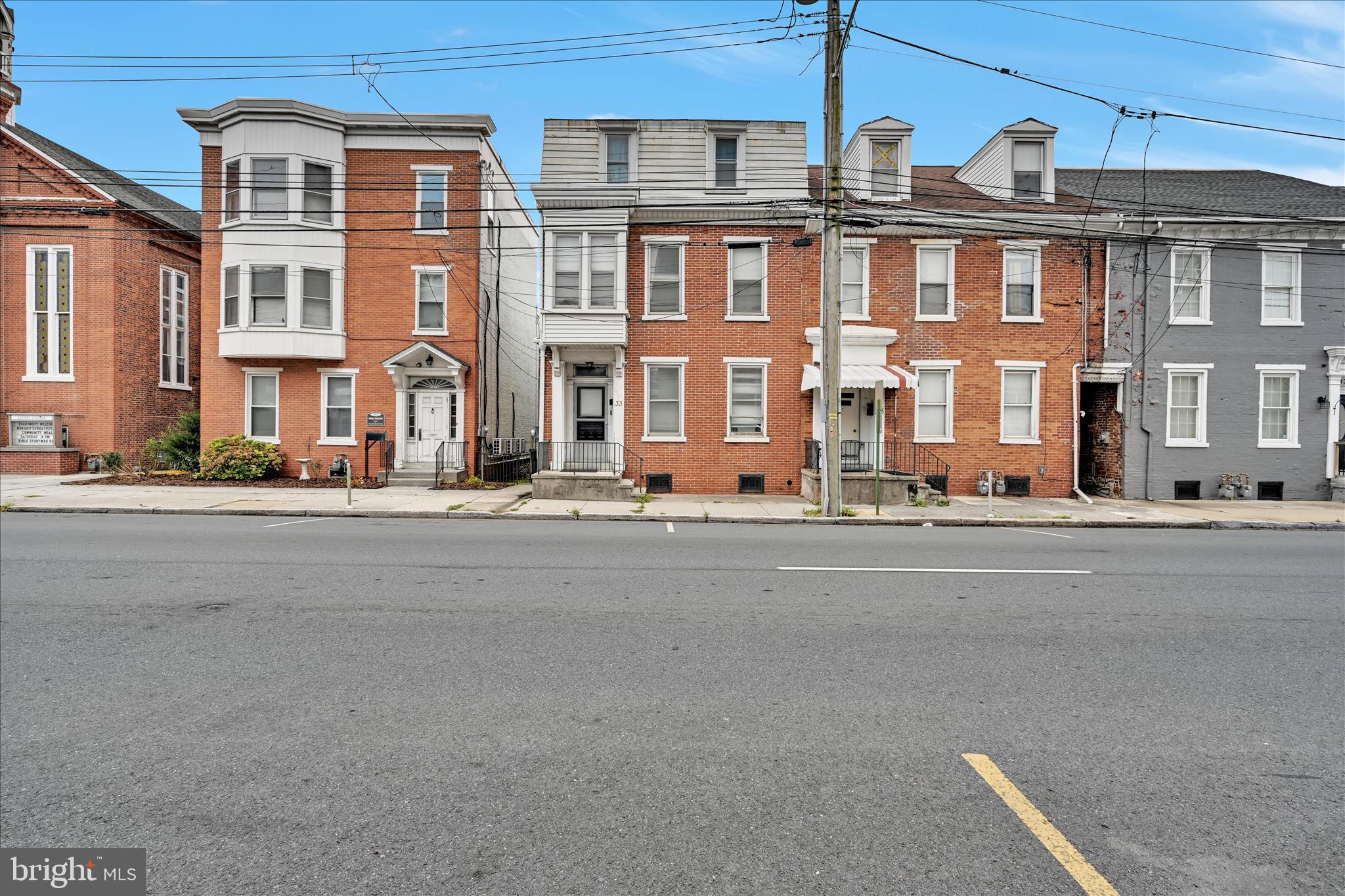 a front view of a building with street