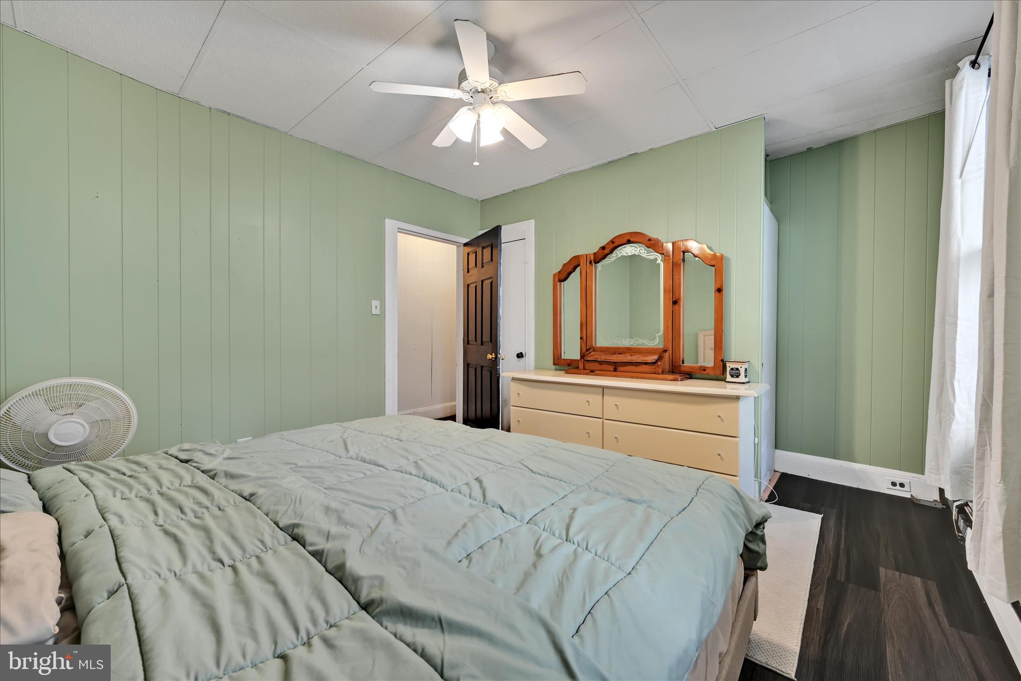 33 North 10th Street Lebanon, PA 17046 - Photo 17 of 31 a bedroom with a bed and a chandelier