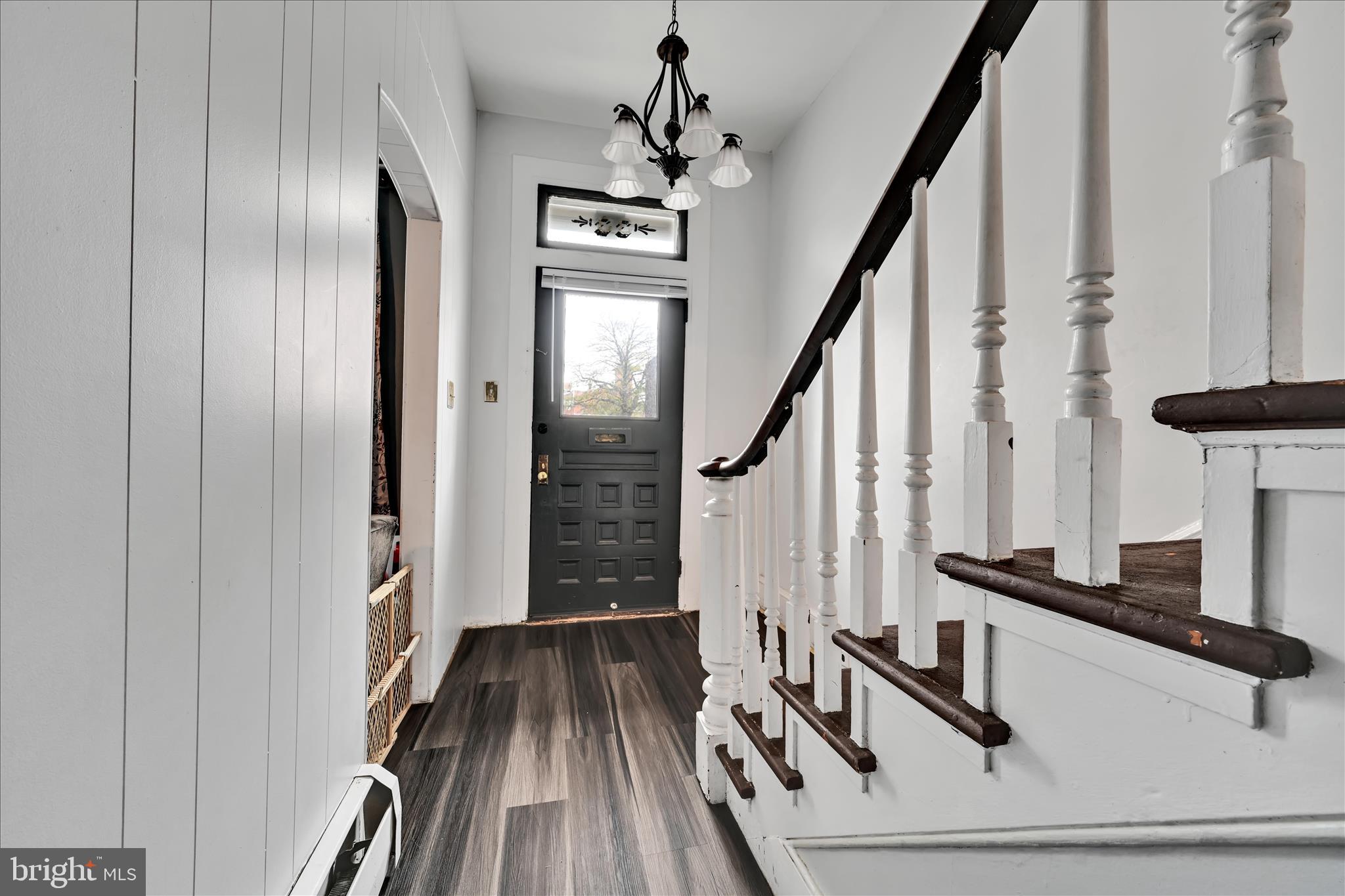 33 North 10th Street Lebanon, PA 17046 - Photo 4 of 31 a view of a hallway with wooden floor and staircase
