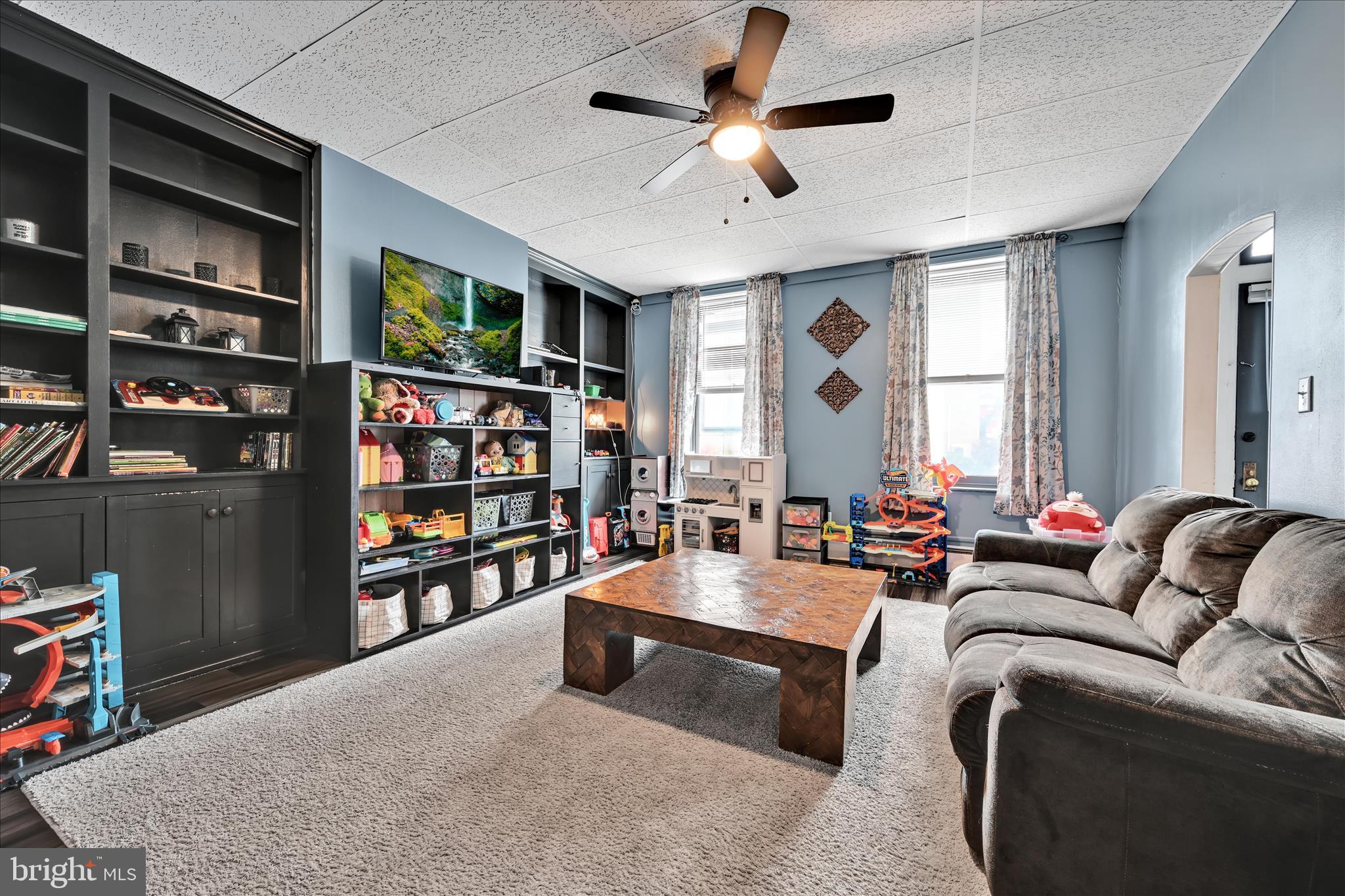 33 North 10th Street Lebanon, PA 17046 - Photo 5 of 31 a living room with furniture and a large window