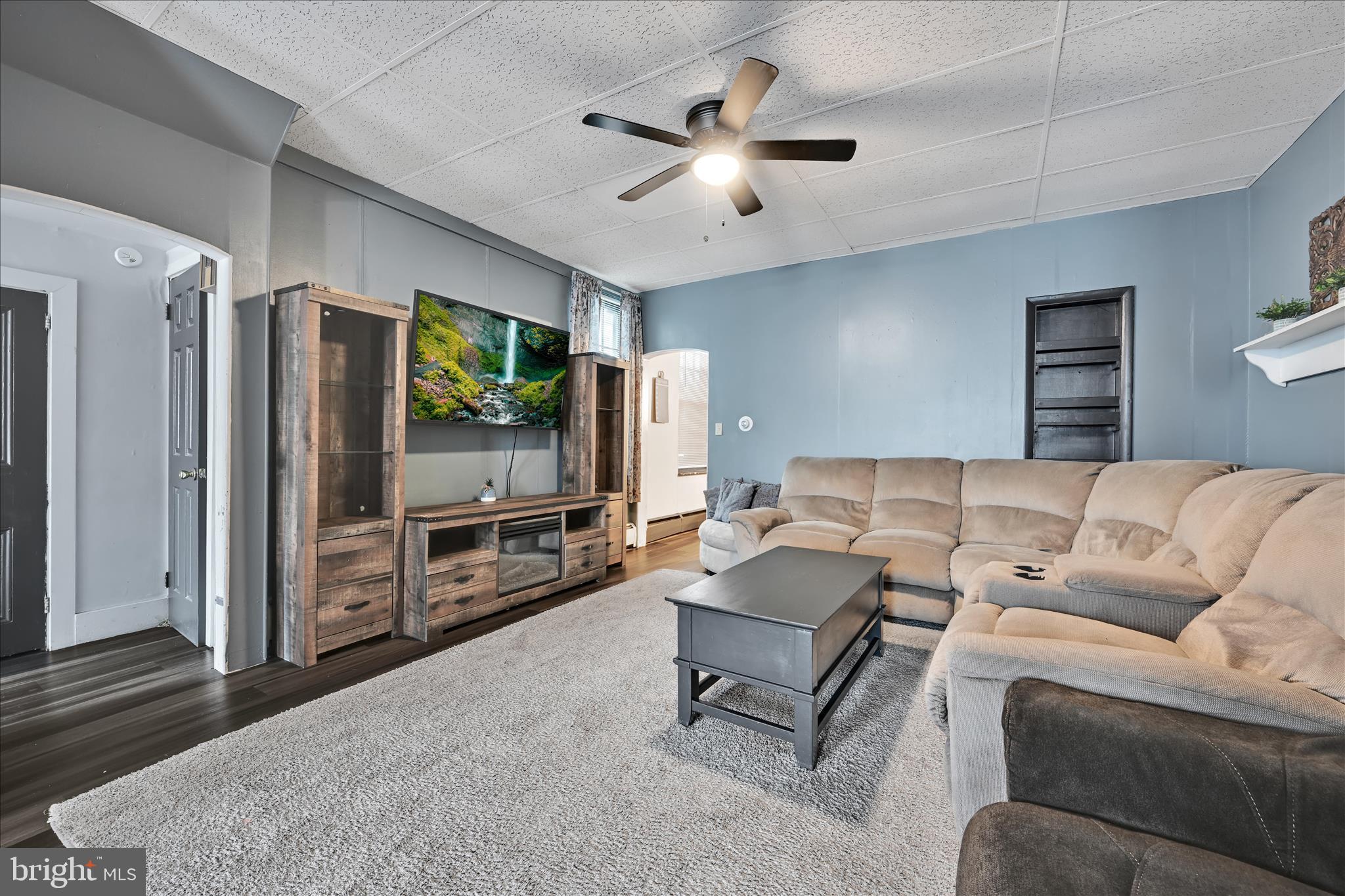 33 North 10th Street Lebanon, PA 17046 - Photo 6 of 31 a living room with furniture and a flat screen tv