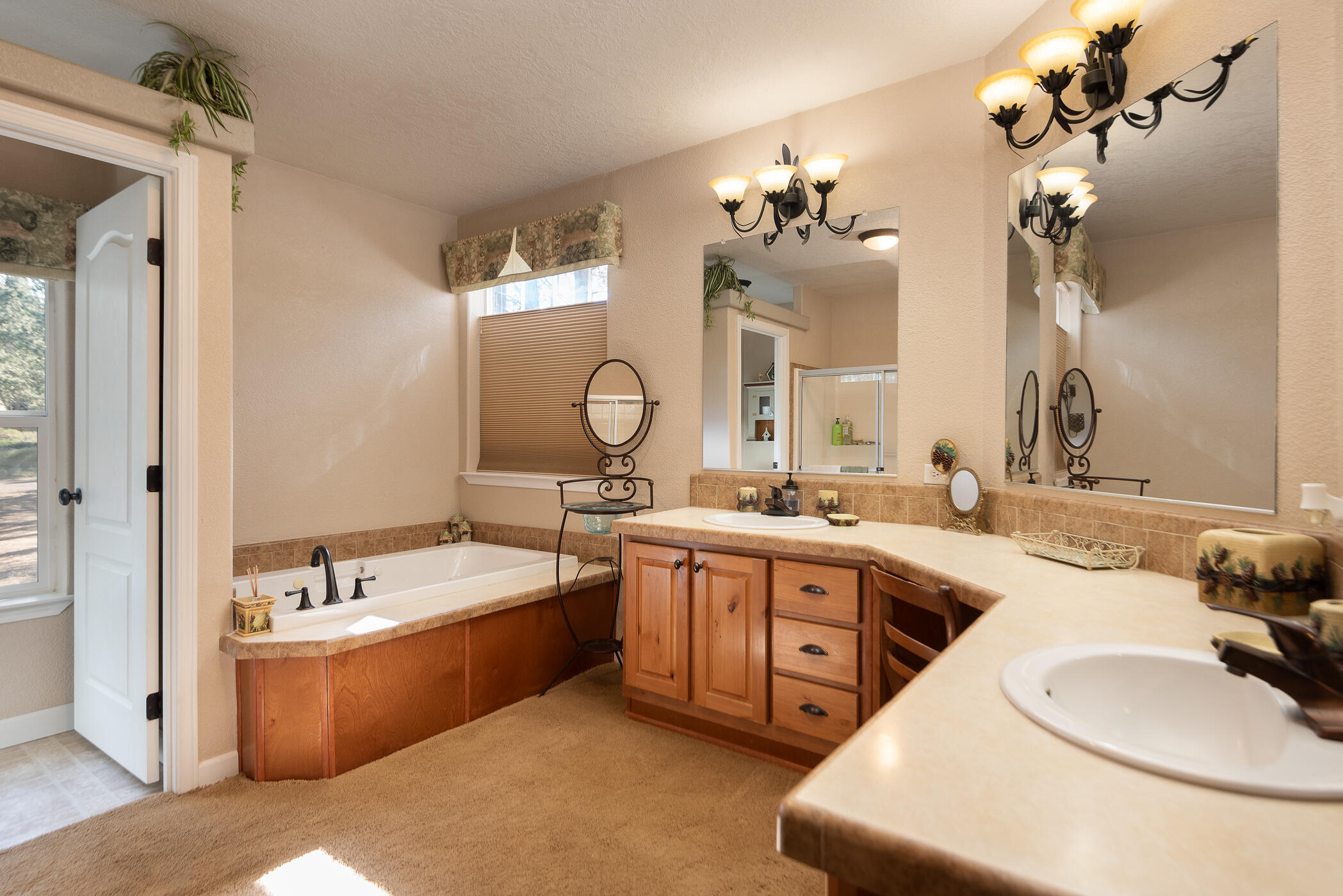 60055 Hopi Road Bend, OR 97702 - Photo 21 of 37 a spacious bathroom with a double vanity sink mirror and