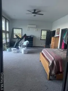 a bed room with a bed and dresser