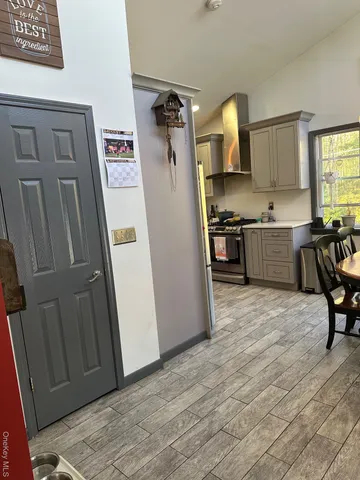 a view of a water fountain in an empty room