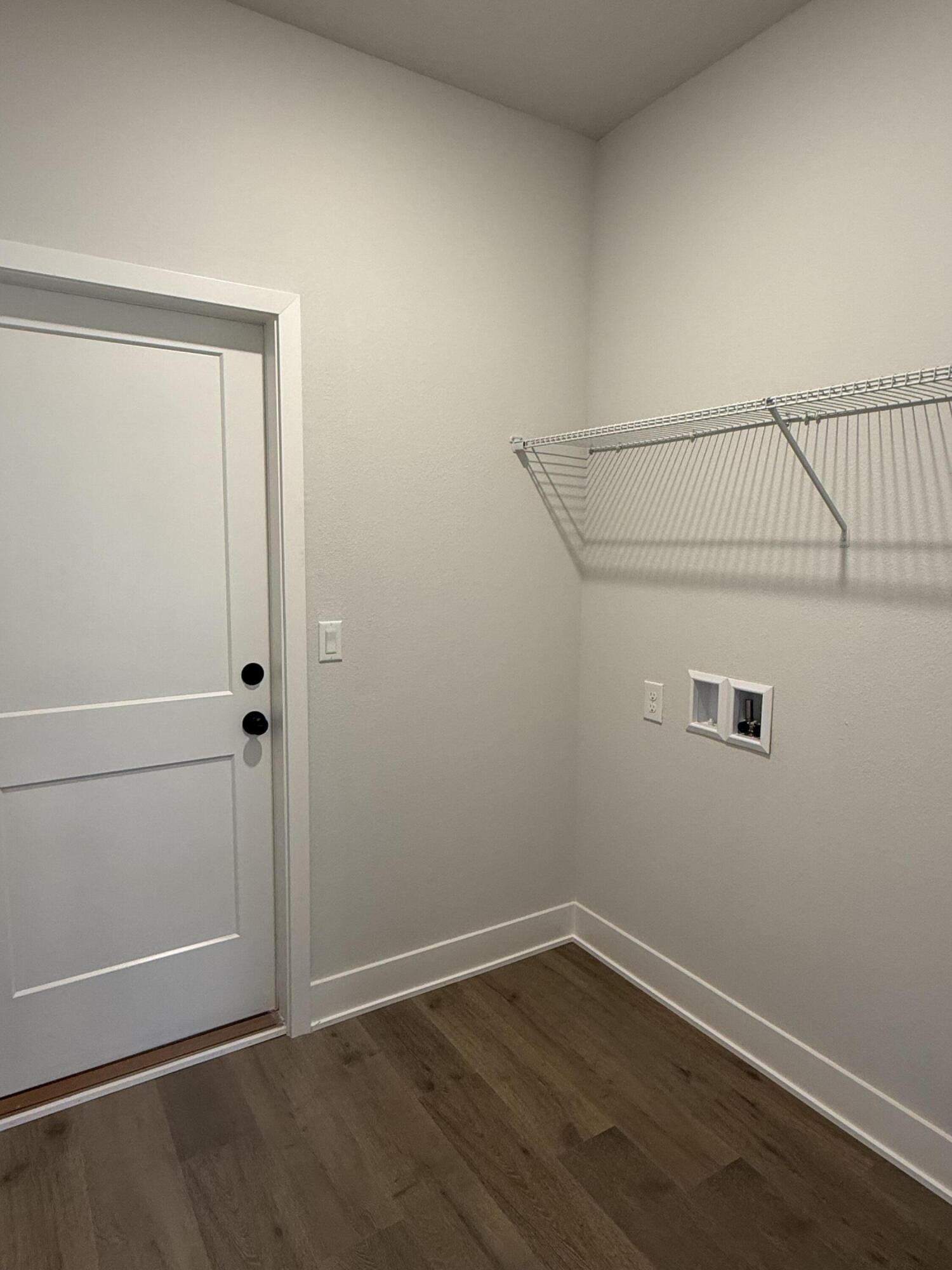 2411 Aleia Lane Crestview, FL 32536 - Photo 13 of 28 a view of small space with wooden floor