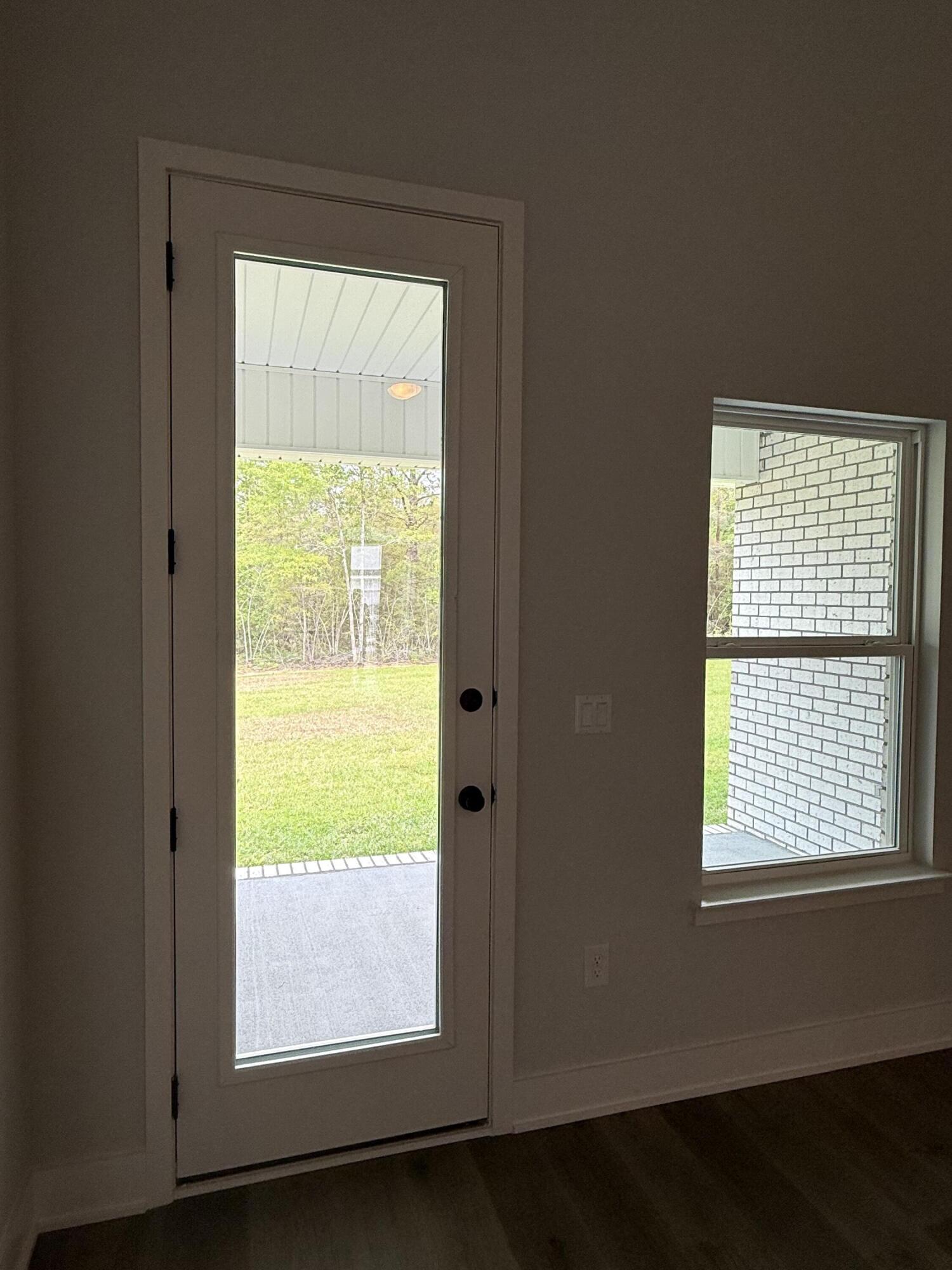2411 Aleia Lane Crestview, FL 32536 - Photo 14 of 28 a view of an empty room with a window