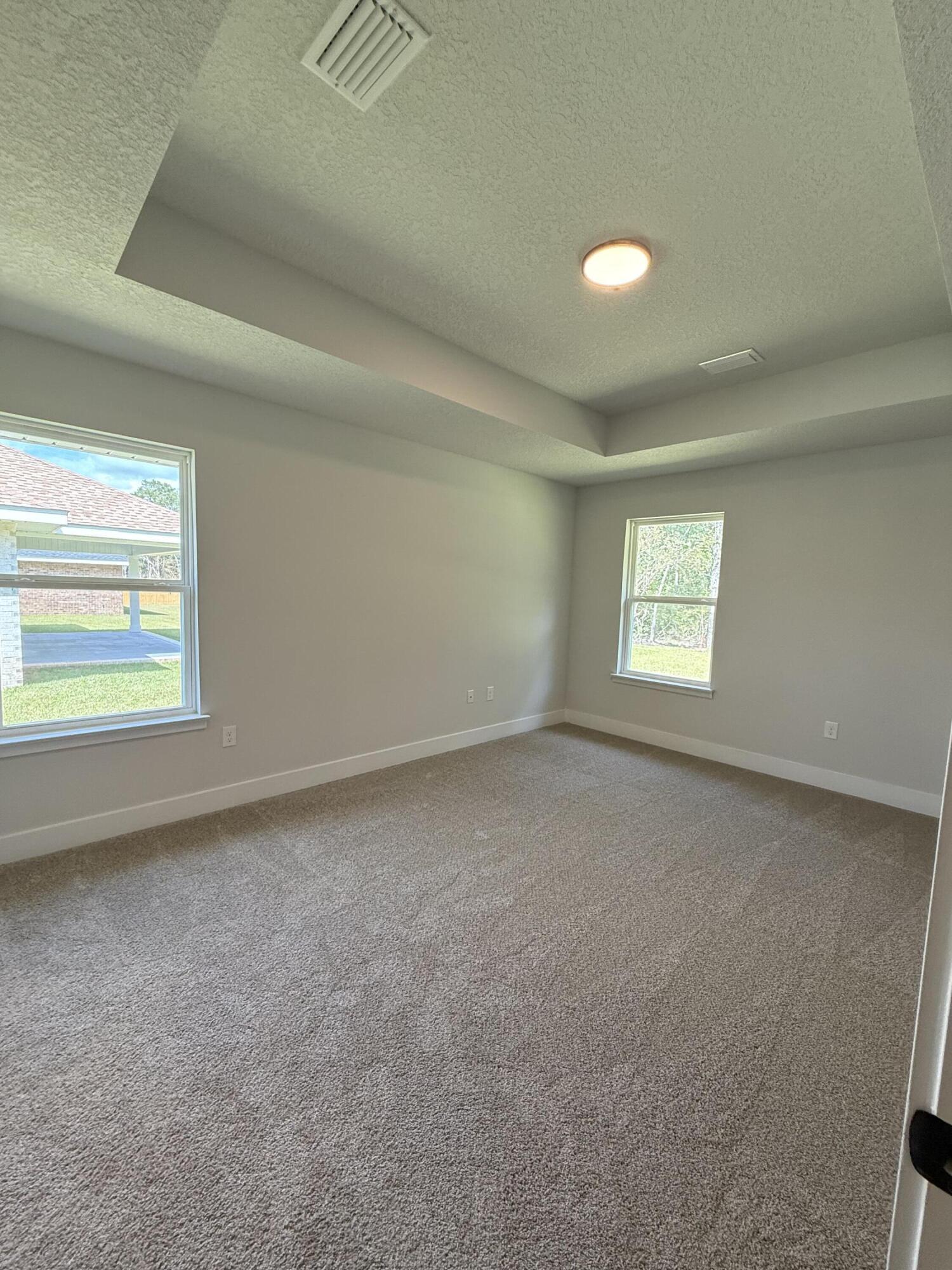 2411 Aleia Lane Crestview, FL 32536 - Photo 15 of 21 an empty room with windows