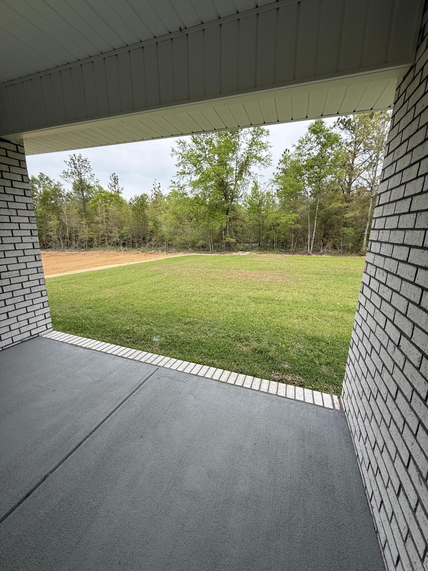 2411 Aleia Lane Crestview, FL 32536 - Photo 24 of 28 a view of outdoor space with swimming pool