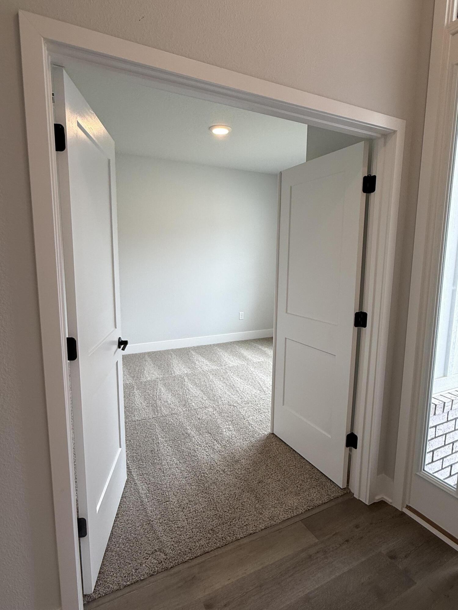 2411 Aleia Lane Crestview, FL 32536 - Photo 7 of 28 an entryway door with wooden floor