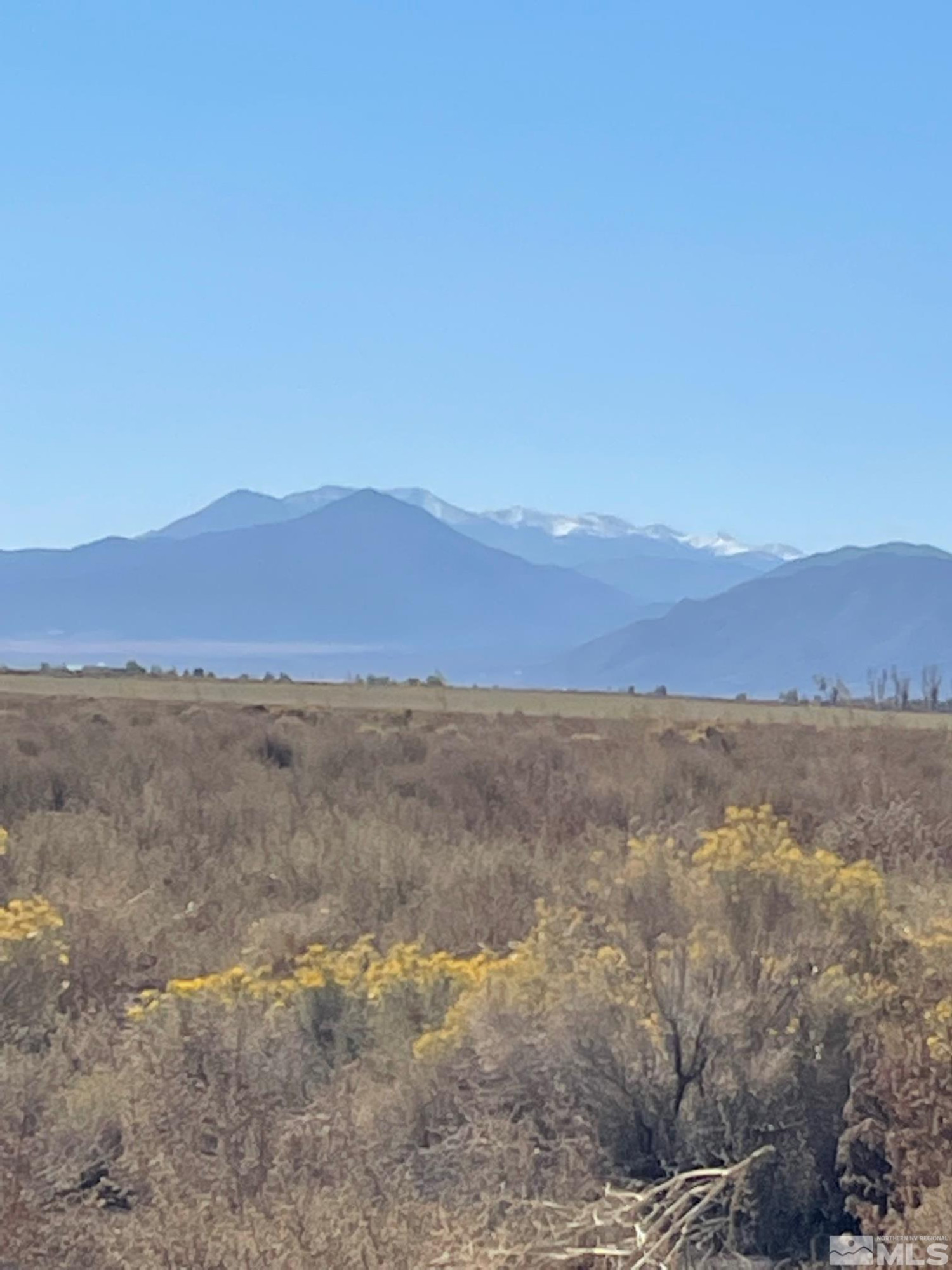 a view of an outdoor space and mountain view