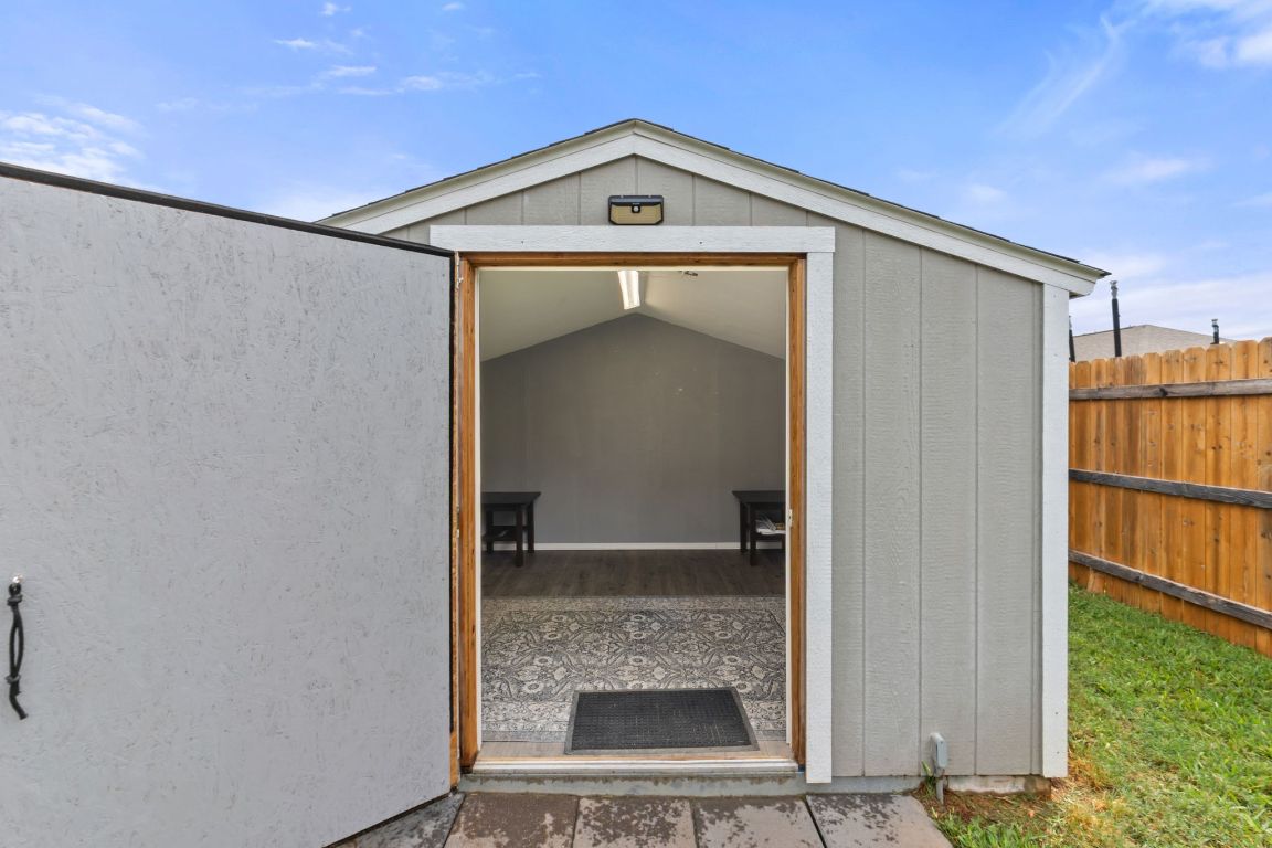 232 Syrah Court Leander, TX 78641 - Photo 26 of 37 a front view of a house with a yard