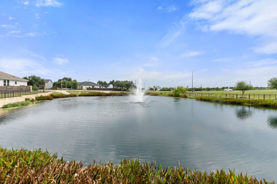 232 Syrah Court Leander, TX 78641 - Photo 31 of 37 a view of a lake with a city view