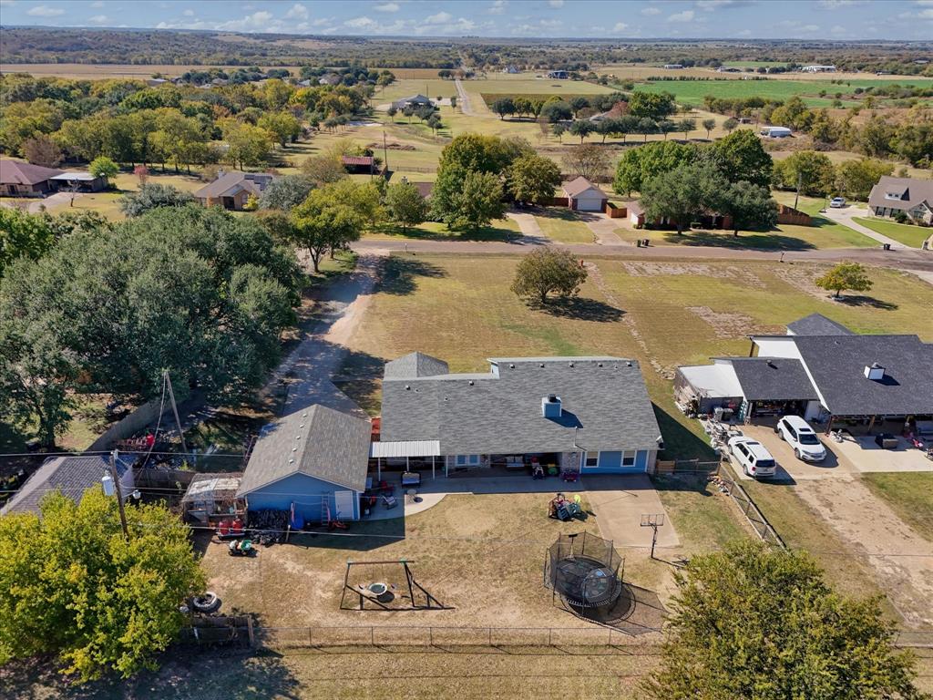 134 Thiele Road Lorena, TX 76655 - Photo 5 of 37 an aerial view of a house with yard swimming pool and outdoor seating