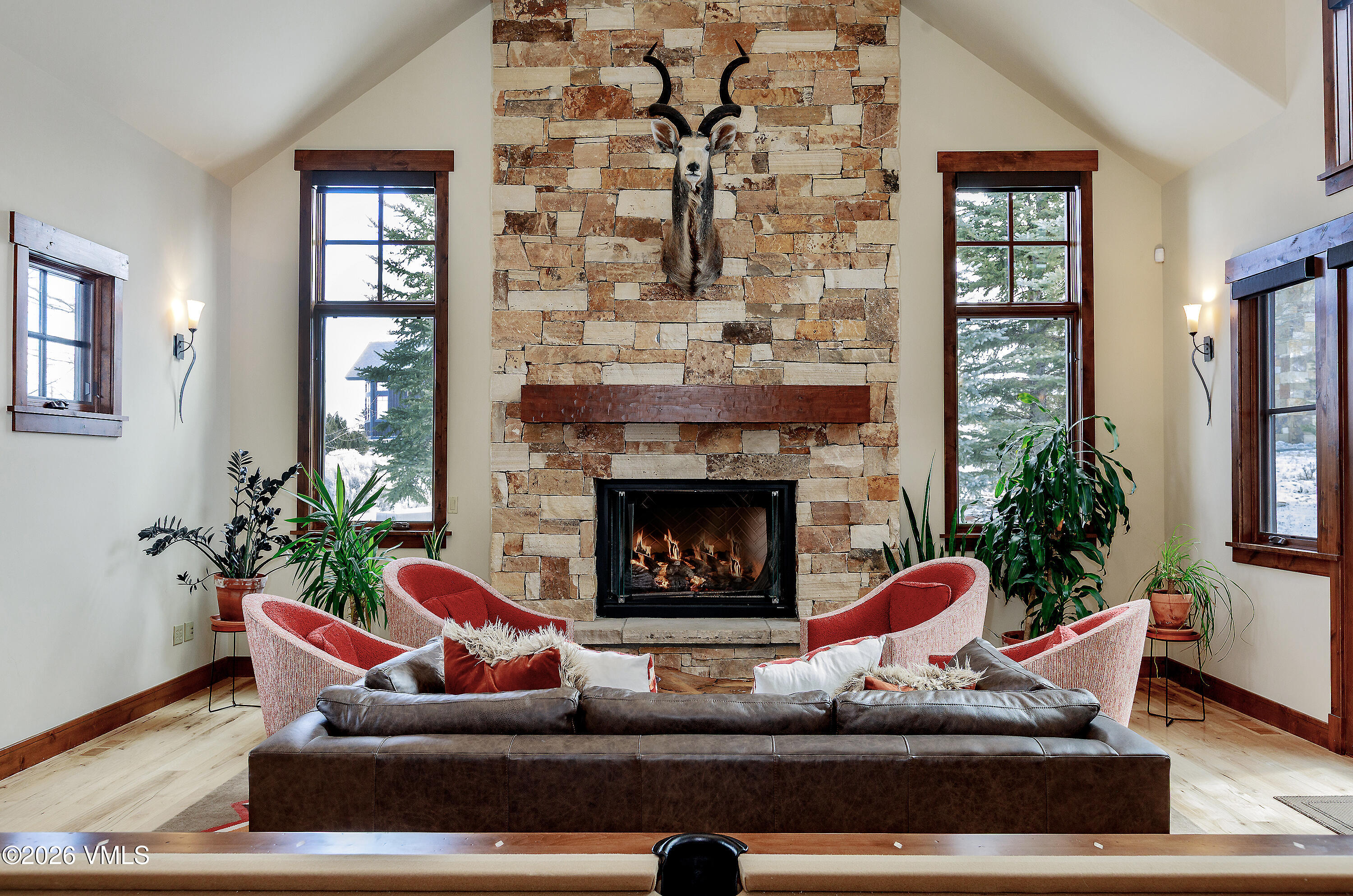 2753 East Haystacker Drive Eagle, CO 81631 - Photo 7 of 41 a living room with furniture and a fireplace