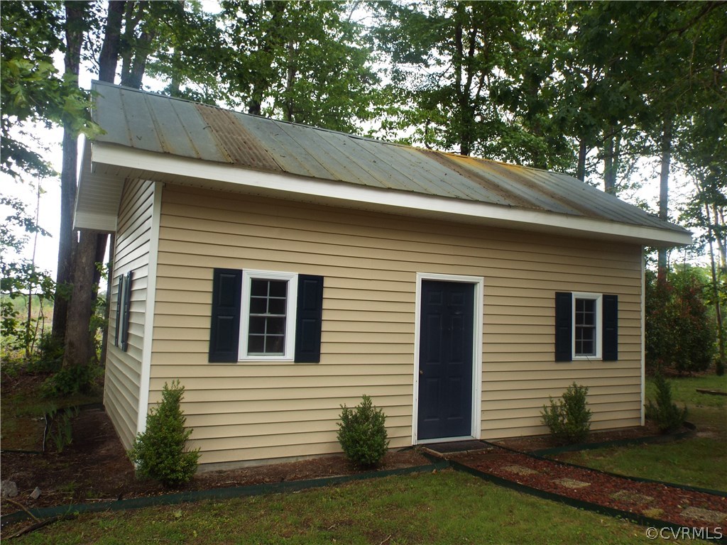 6303 Trinity Church Road Church Road, VA 23833 - Photo 30 of 46 a view of a house with a yard