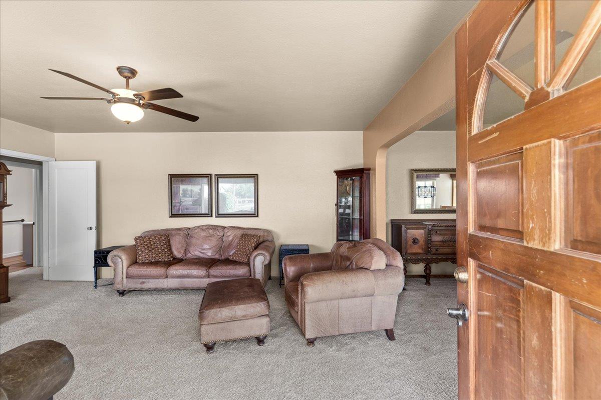 4701 Lone Tree Road Valley Home, CA 95361 - Photo 10 of 59 a living room with furniture