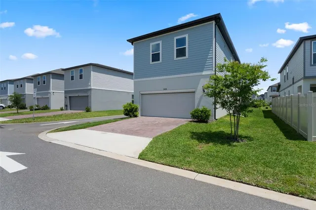 a view of a golf course with a lake