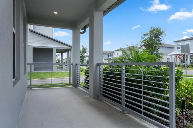 a view of front door with wooden floor