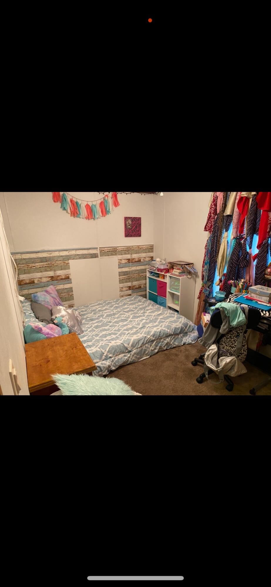 122 Haddock Lane Benton, TN 37307 - Photo 18 of 23 a view of a room with wooden floor and a flat screen tv