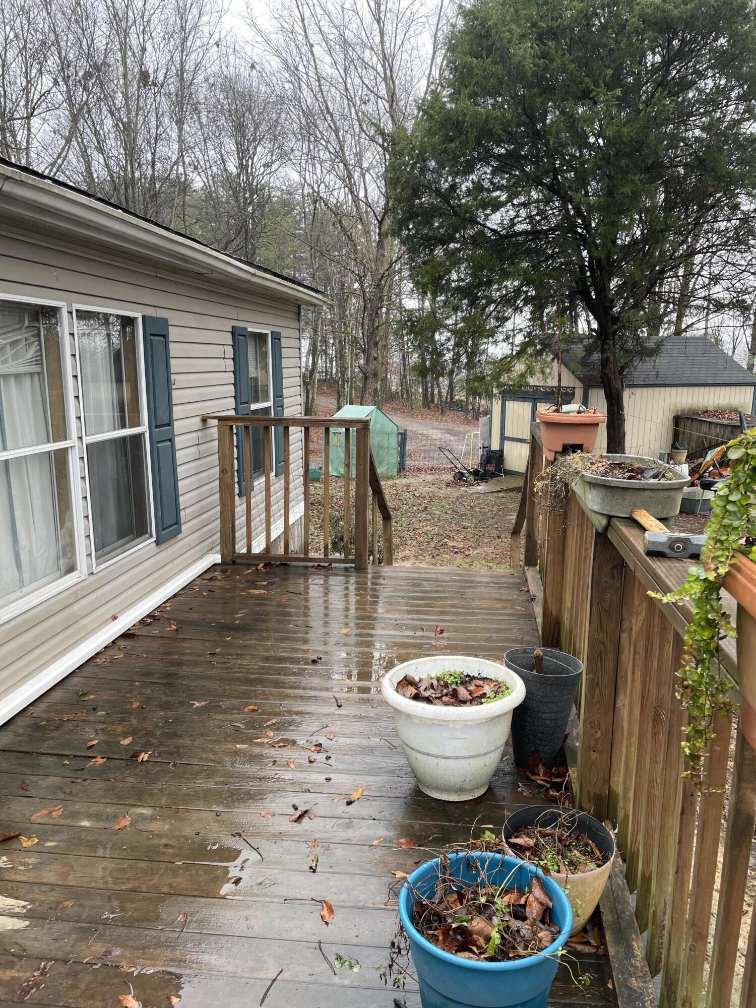 122 Haddock Lane Benton, TN 37307 - Photo 7 of 23 a view of a backyard with fountain