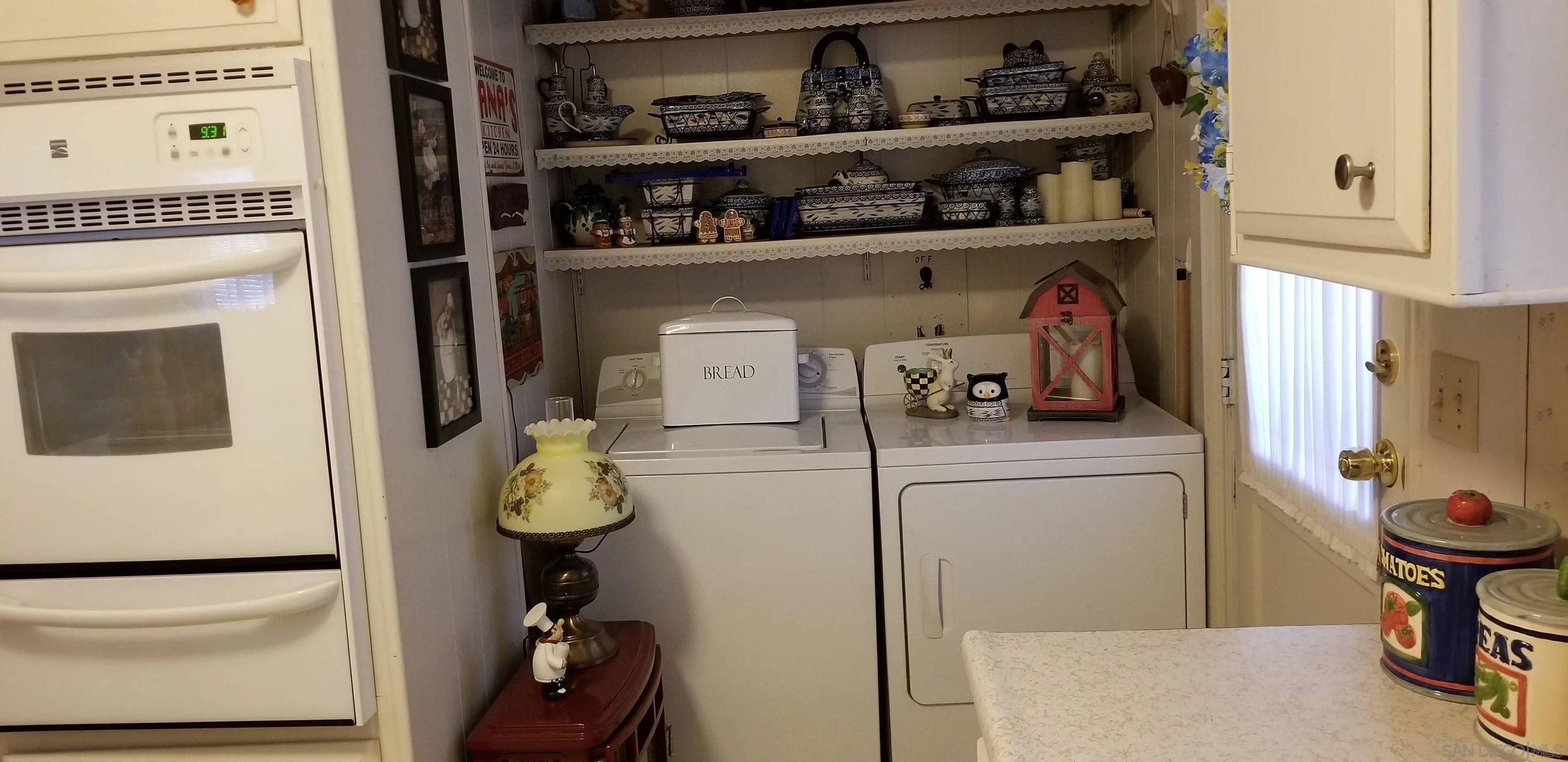2400 Alpine Boulevard, Unit 84 Alpine, CA 91901 - Photo 12 of 16 a kitchen with a refrigerator and a stove