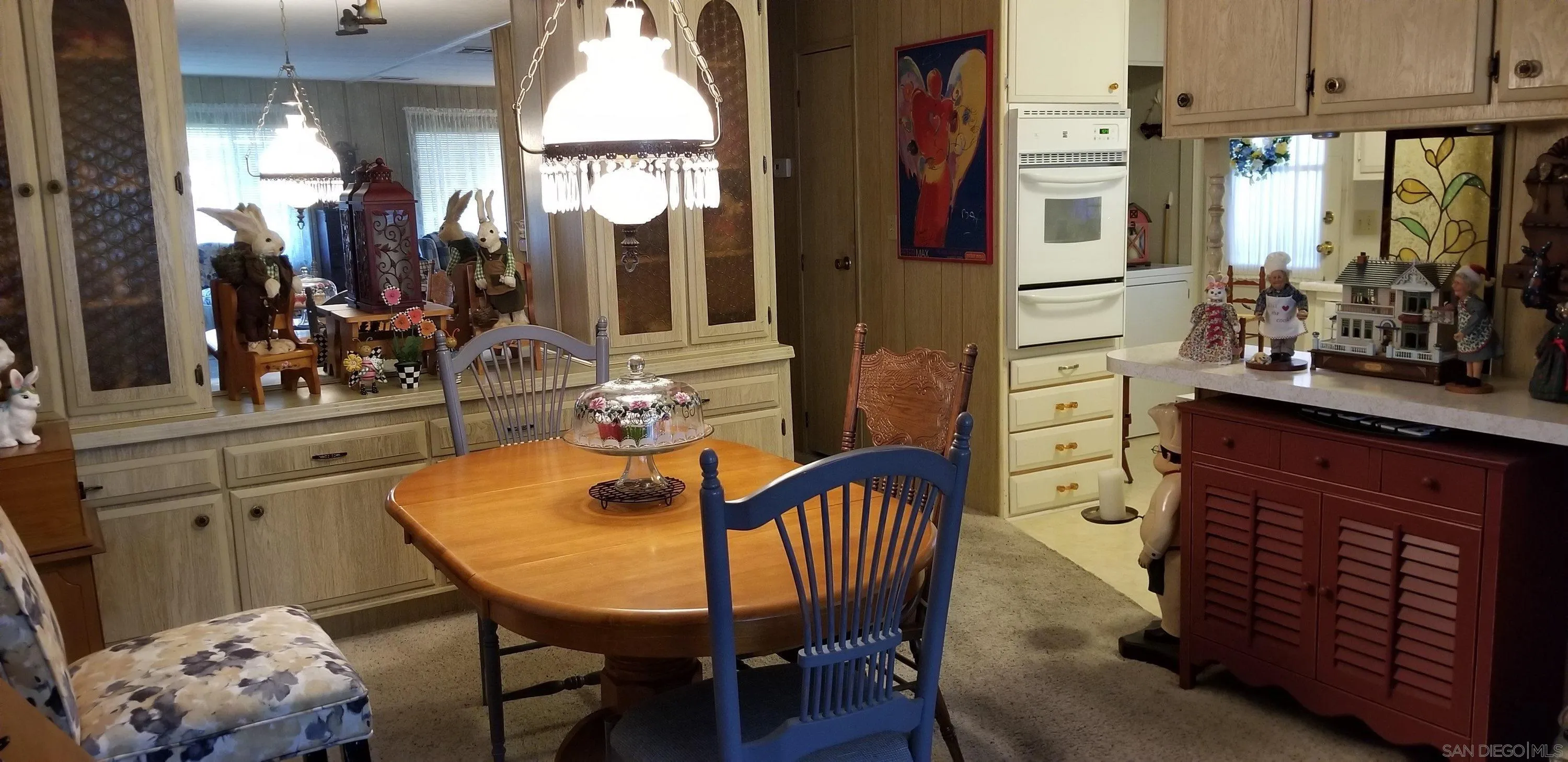 2400 Alpine Boulevard, Unit 84 Alpine, CA 91901 - Photo 13 of 16 a view of a dining room with furniture and window