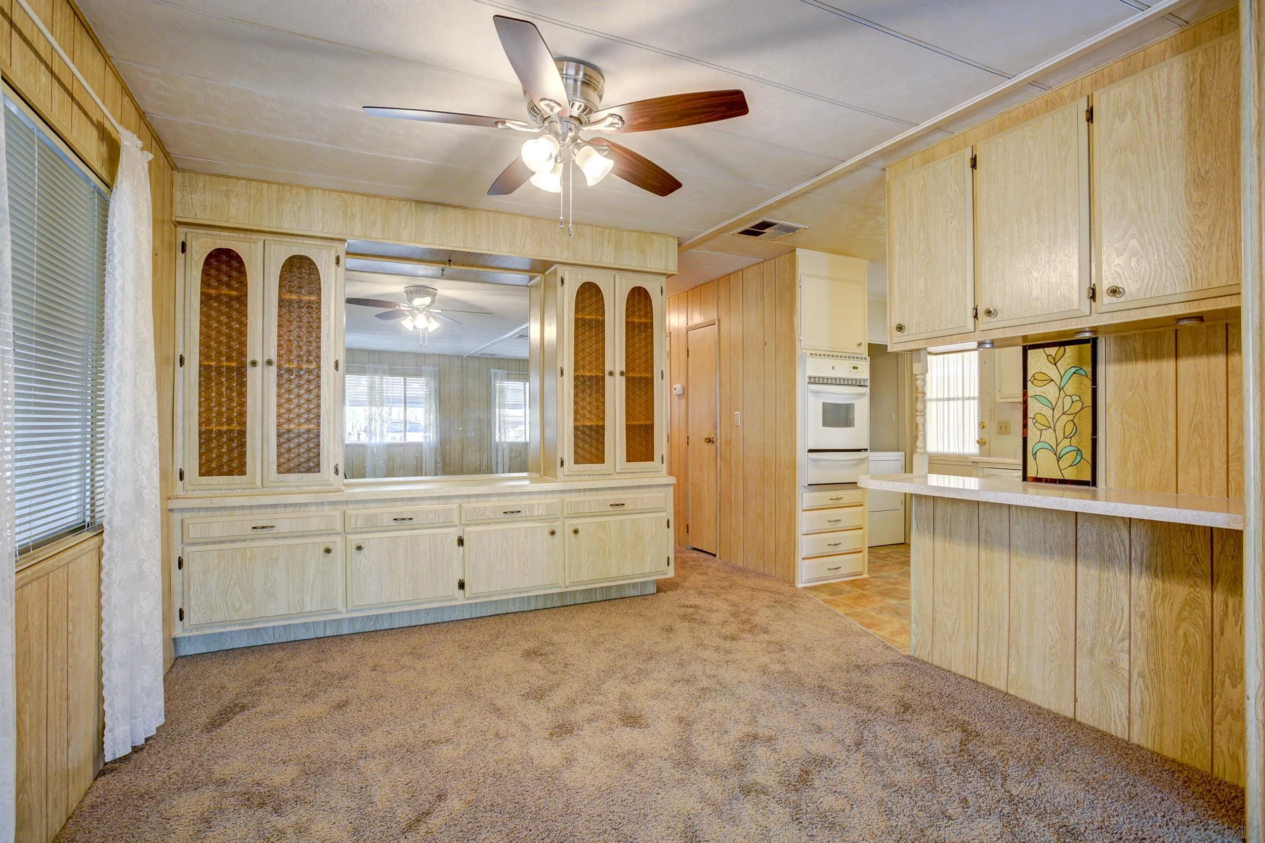 2400 Alpine Boulevard, Unit 84 Alpine, CA 91901 - Photo 3 of 16 a spacious bathroom with a granite countertop sink mirror and a shower