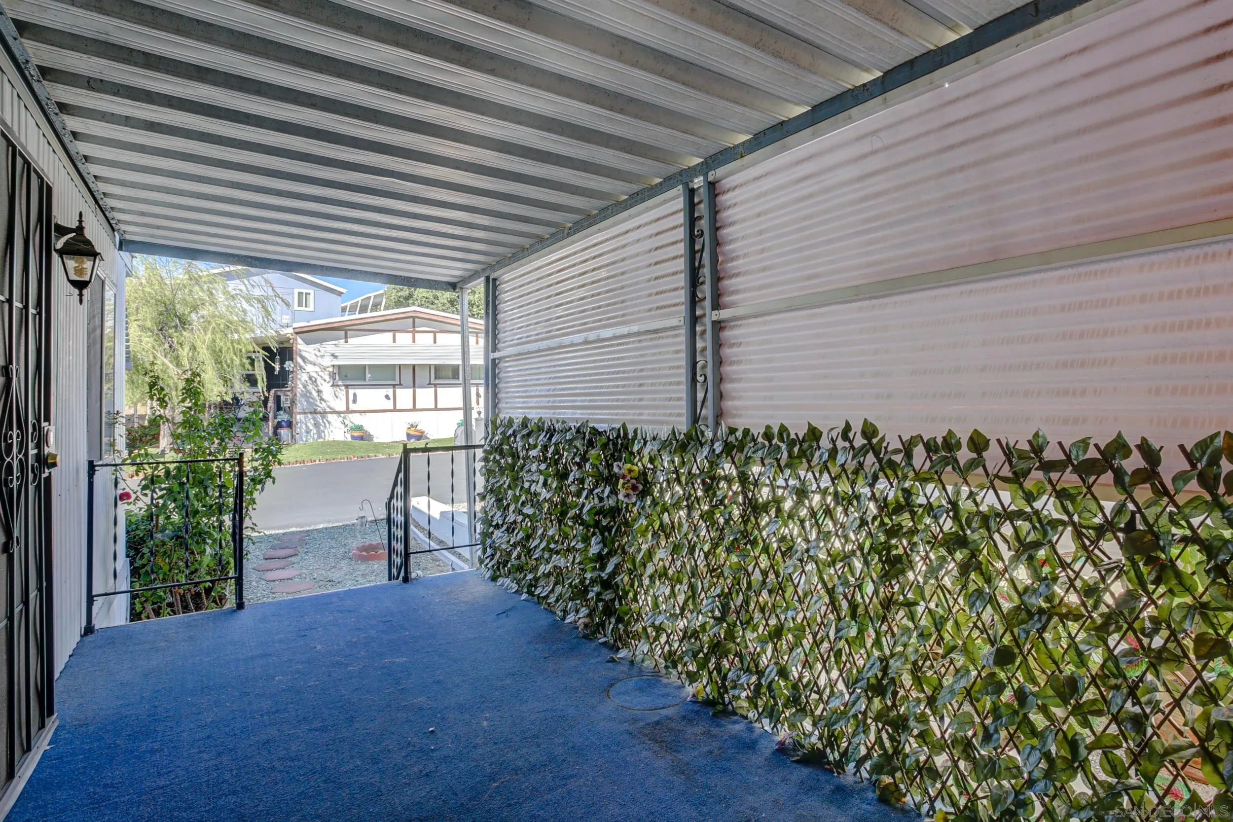 2400 Alpine Boulevard, Unit 84 Alpine, CA 91901 - Photo 8 of 16 a entryway of a house with a garden