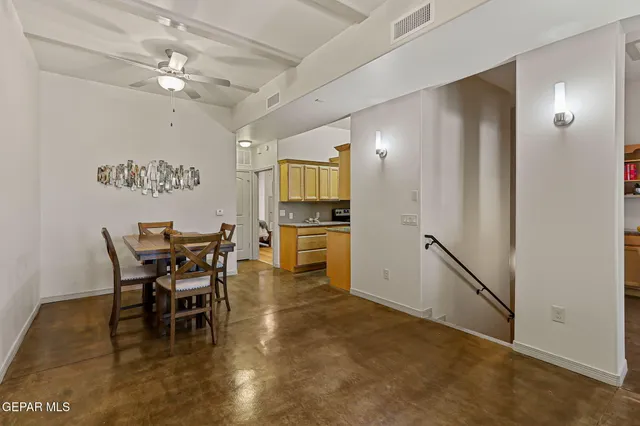 a view of workspace with wooden floor and windows