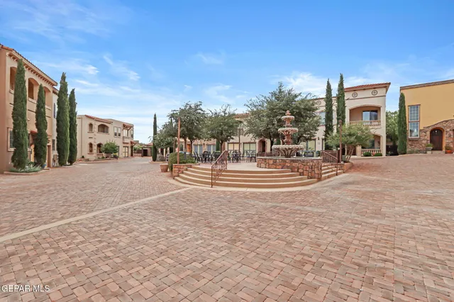 a bedroom with a bed dresser and a window