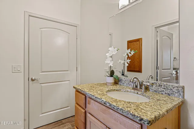 a view of living room with furniture and a floor to ceiling window