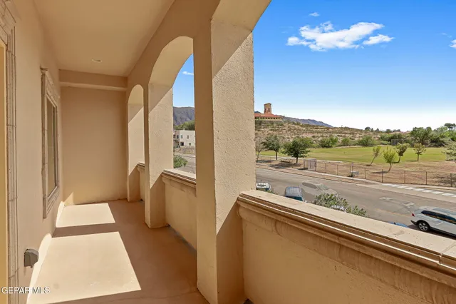 a view of living room with furniture and city view