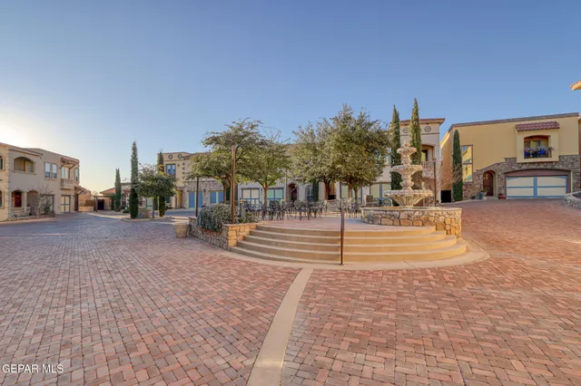 a view of city with tall buildings