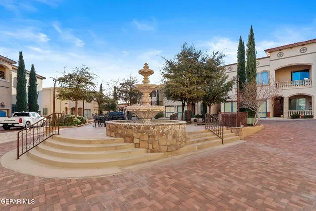 a view of a tables and chairs in patio