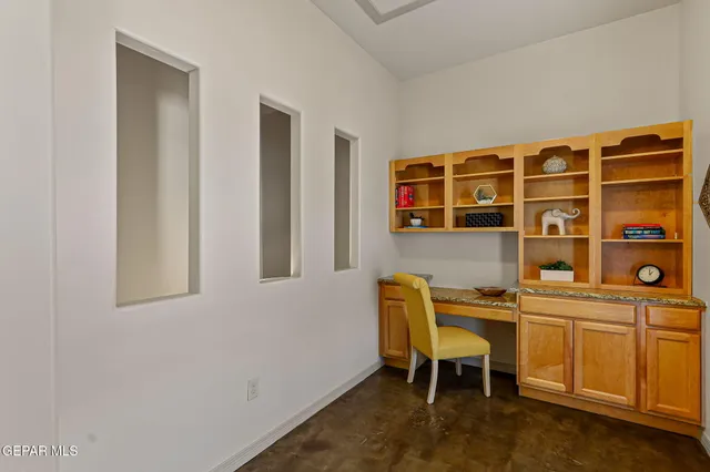 a view of a balcony with an outdoor space and seating