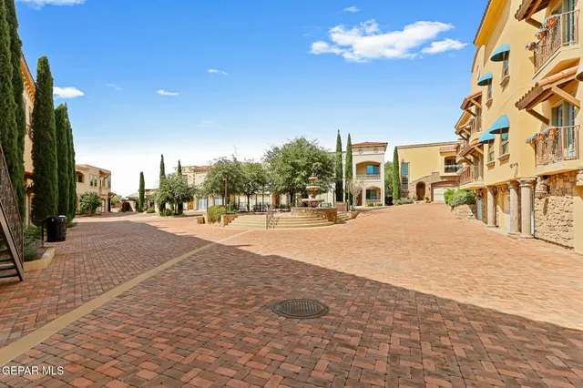 a view of a building with a yard