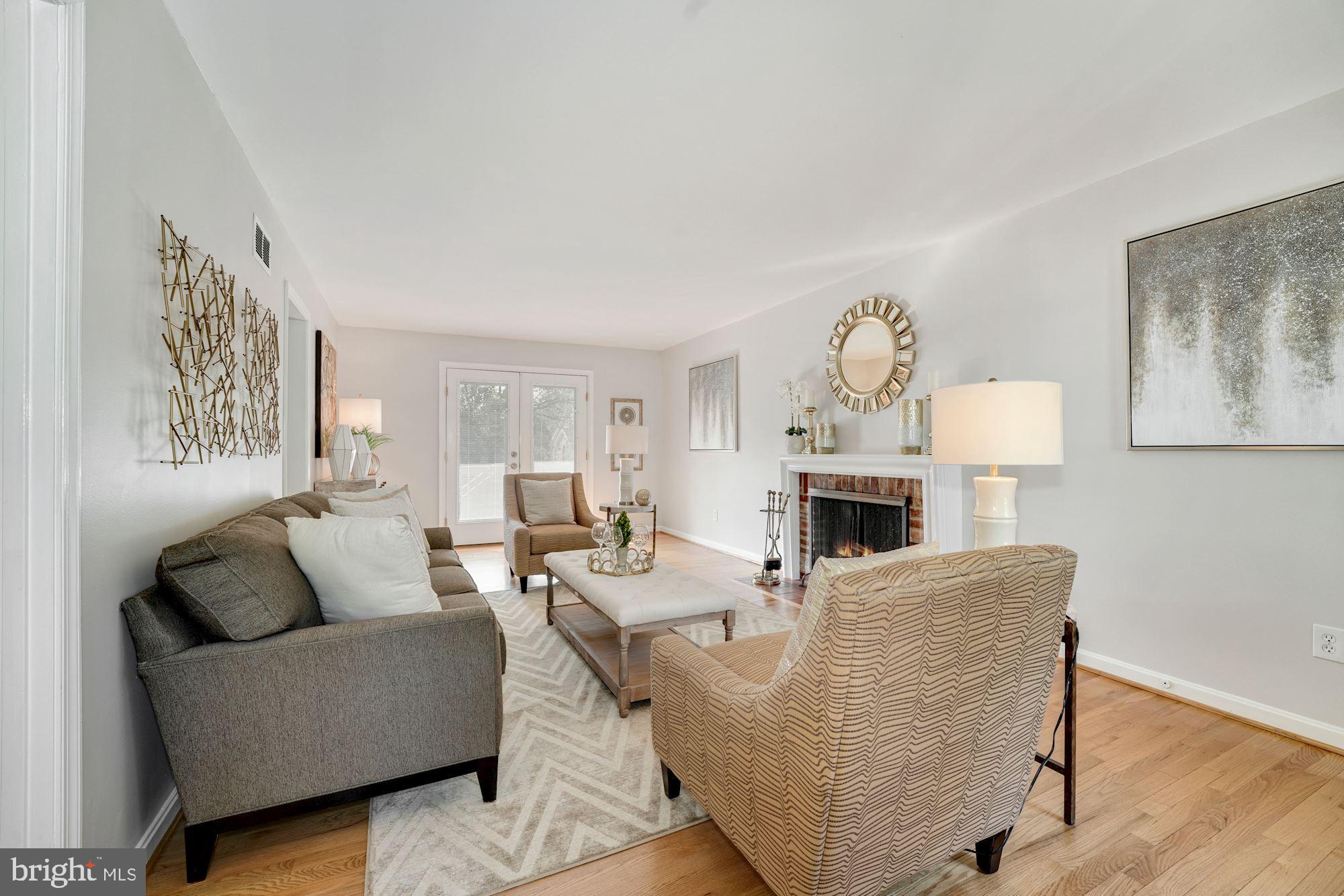 2610 Marcey Road Arlington, VA 22207 - Photo 6 of 49 Spacious Living Room with Access to Outdoor Deck