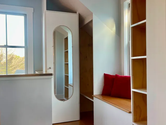 a view of living room with furniture and window