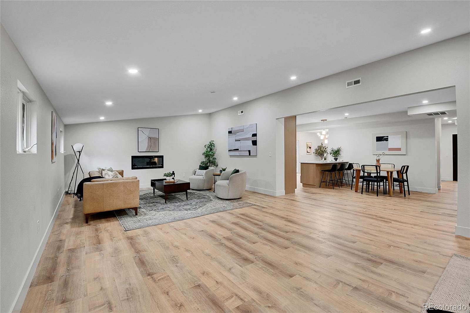 8919 South Hillview Road Morrison, CO 80465 - Photo 18 of 50 a living room with furniture and a table