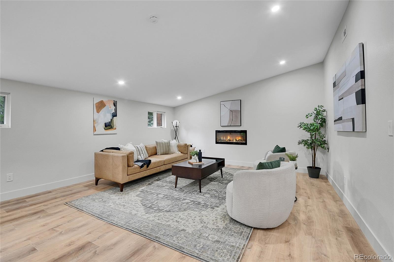 8919 South Hillview Road Morrison, CO 80465 - Photo 21 of 50 a living room with furniture and a couch