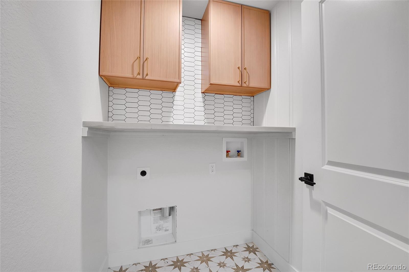 8919 South Hillview Road Morrison, CO 80465 - Photo 36 of 50 a bathroom with a sink and a vanity