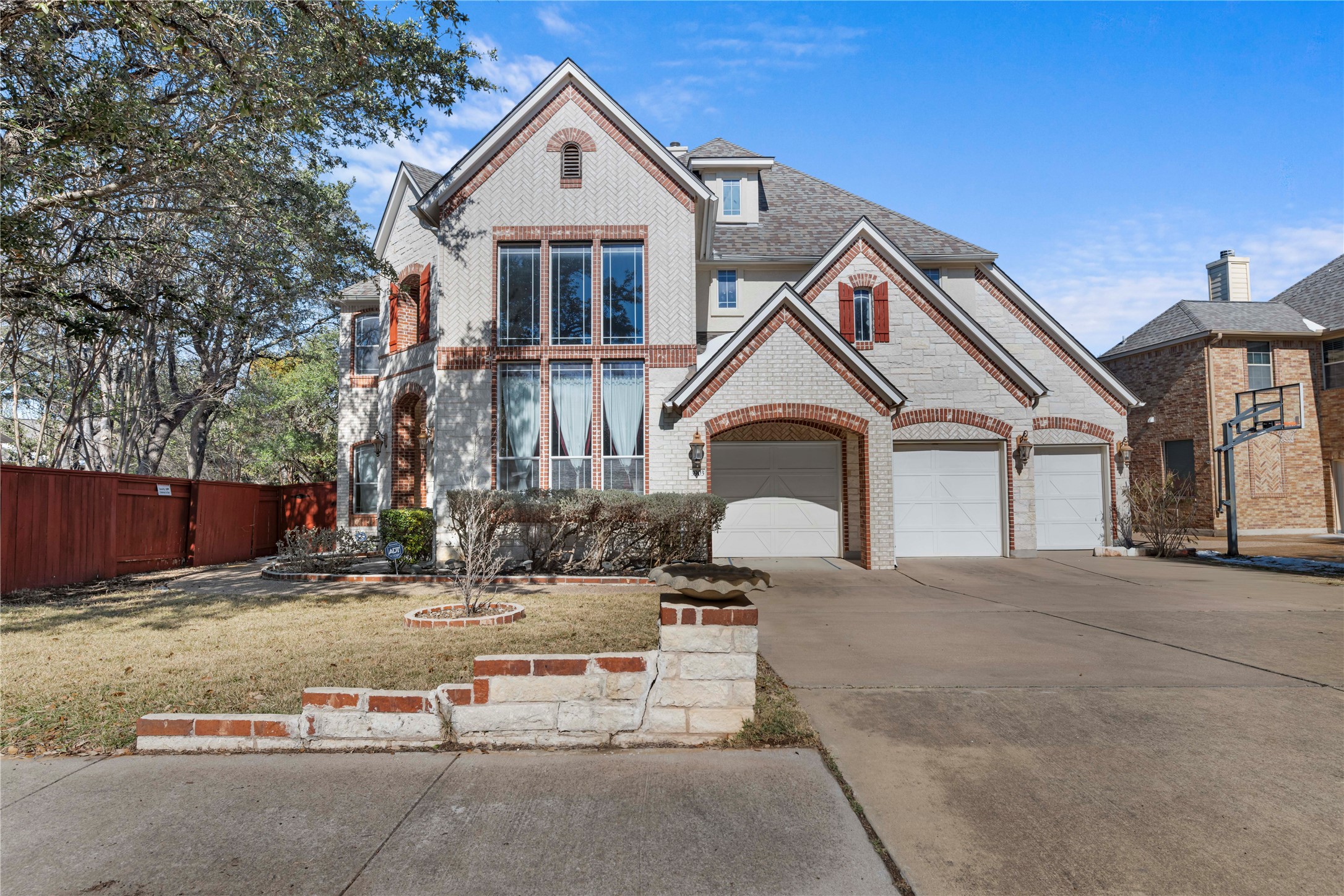 3903 Remington Road Cedar Park, TX 78613 - Photo 1 of 40 a front view of a house with a yard