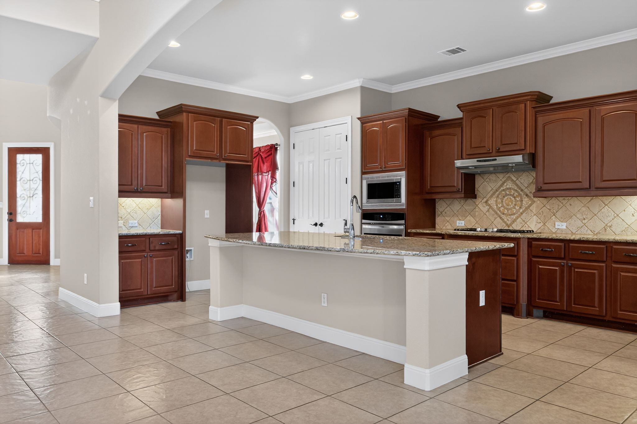 3903 Remington Road Cedar Park, TX 78613 - Photo 12 of 40 a kitchen with stainless steel appliances granite countertop a refrigerator and a sink