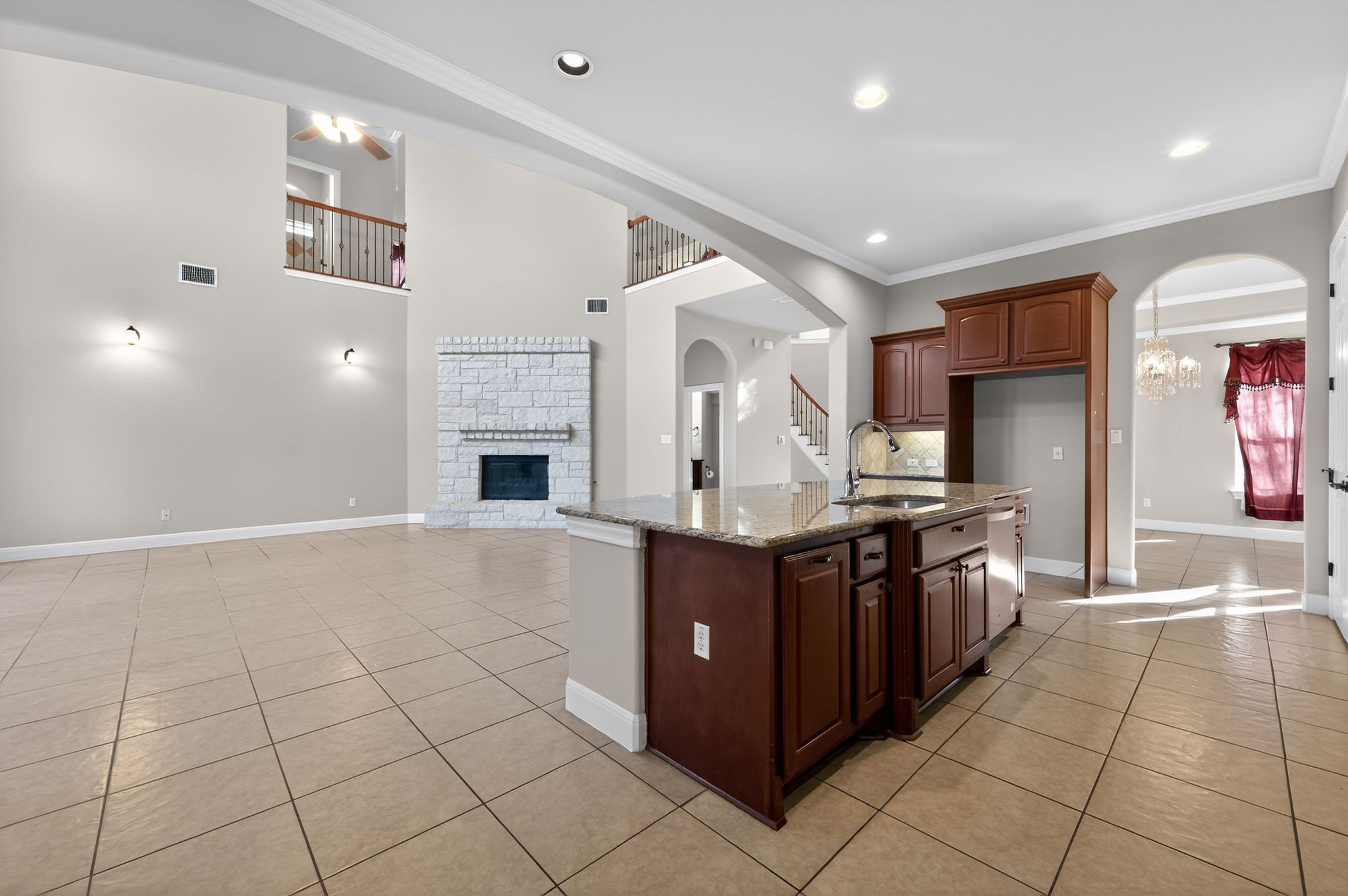 3903 Remington Road Cedar Park, TX 78613 - Photo 39 of 40 a large kitchen with stainless steel appliances granite countertop a stove and cabinets