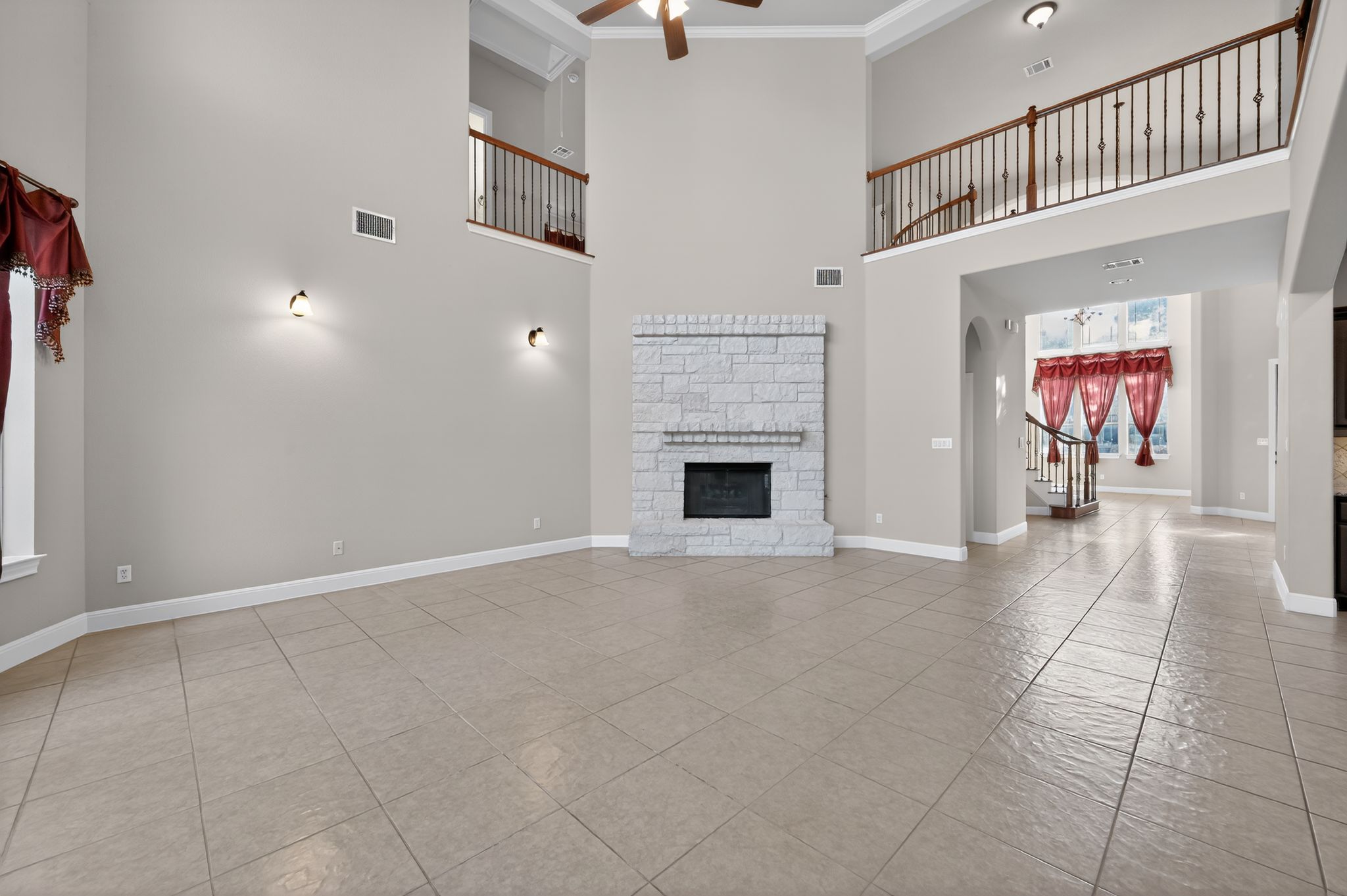 3903 Remington Road Cedar Park, TX 78613 - Photo 15 of 40 an empty room with windows and fireplace