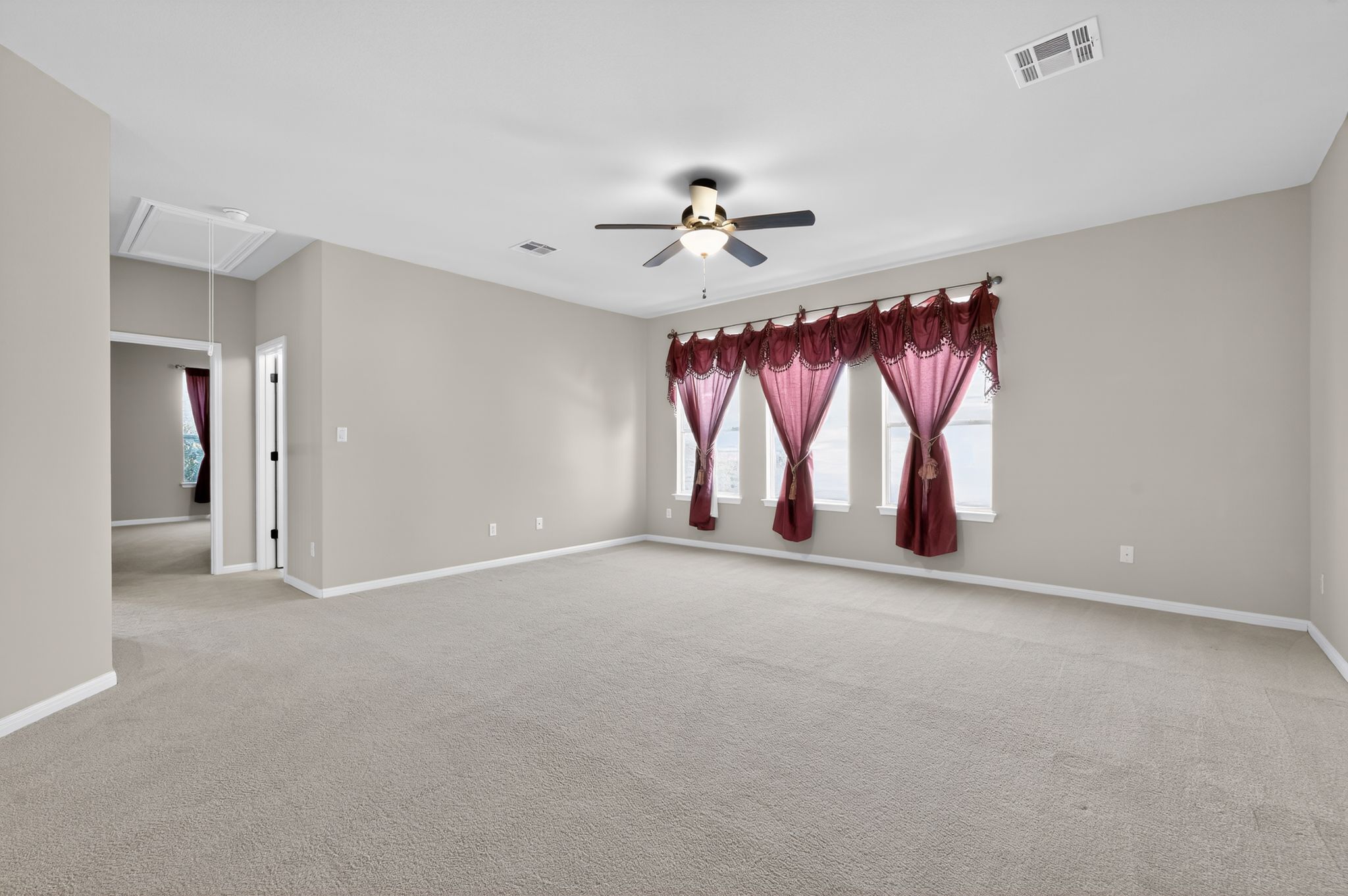 3903 Remington Road Cedar Park, TX 78613 - Photo 23 of 40 an empty room with windows and fan